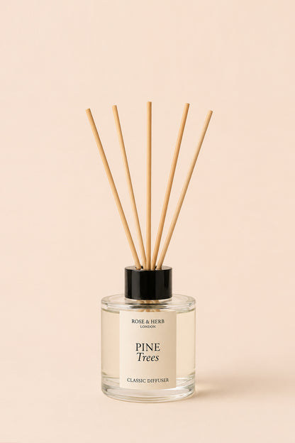 Pine Trees Classic Reed Diffuser by ROSE & HERB with five natural rattan reeds