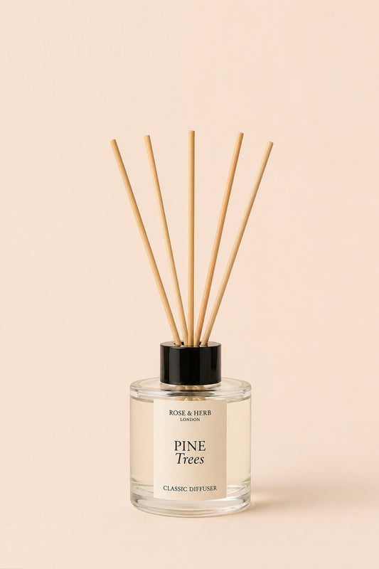 Pine Trees Classic Reed Diffuser by ROSE & HERB with five natural rattan reeds